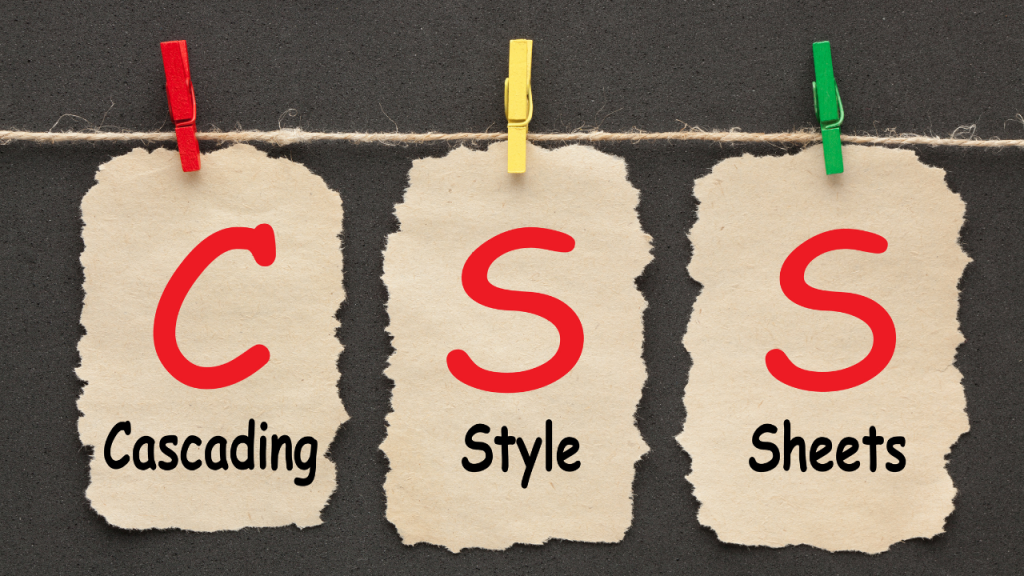 CSSと書かれた紙がクリップで止まっており、CはCascading、SはStyle、SはSheetsと書かれている。